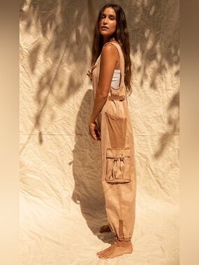 FP Movement Free People Fast Track Onesie Jumpsuit Stretchy Utility Sandshell M